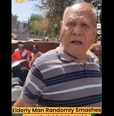 Elderly Man Randomly Smashes Car Windshield in Noida, Walks Away Calmly 2025